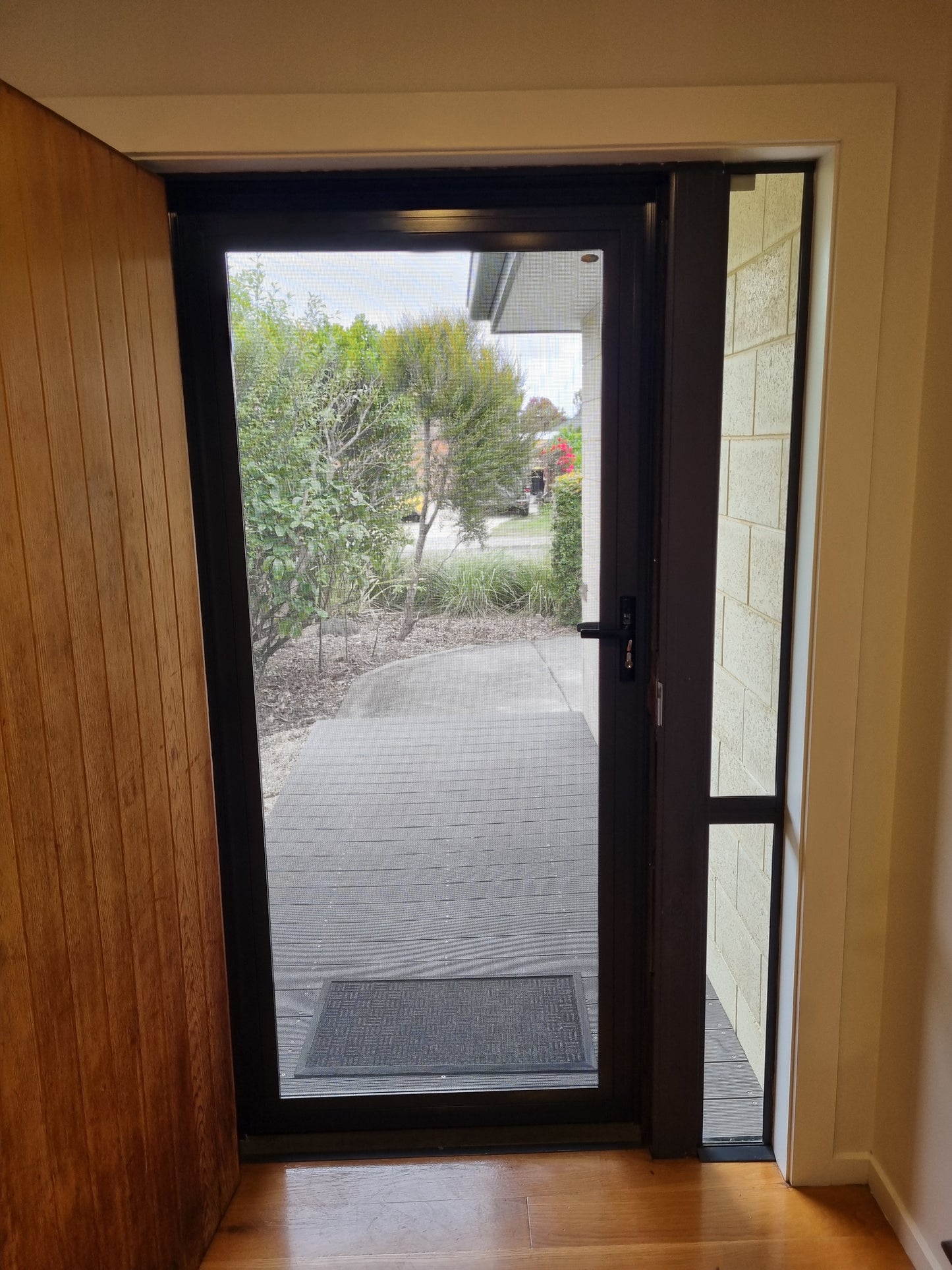 Looking out of a Crimsafe security door in front doorway